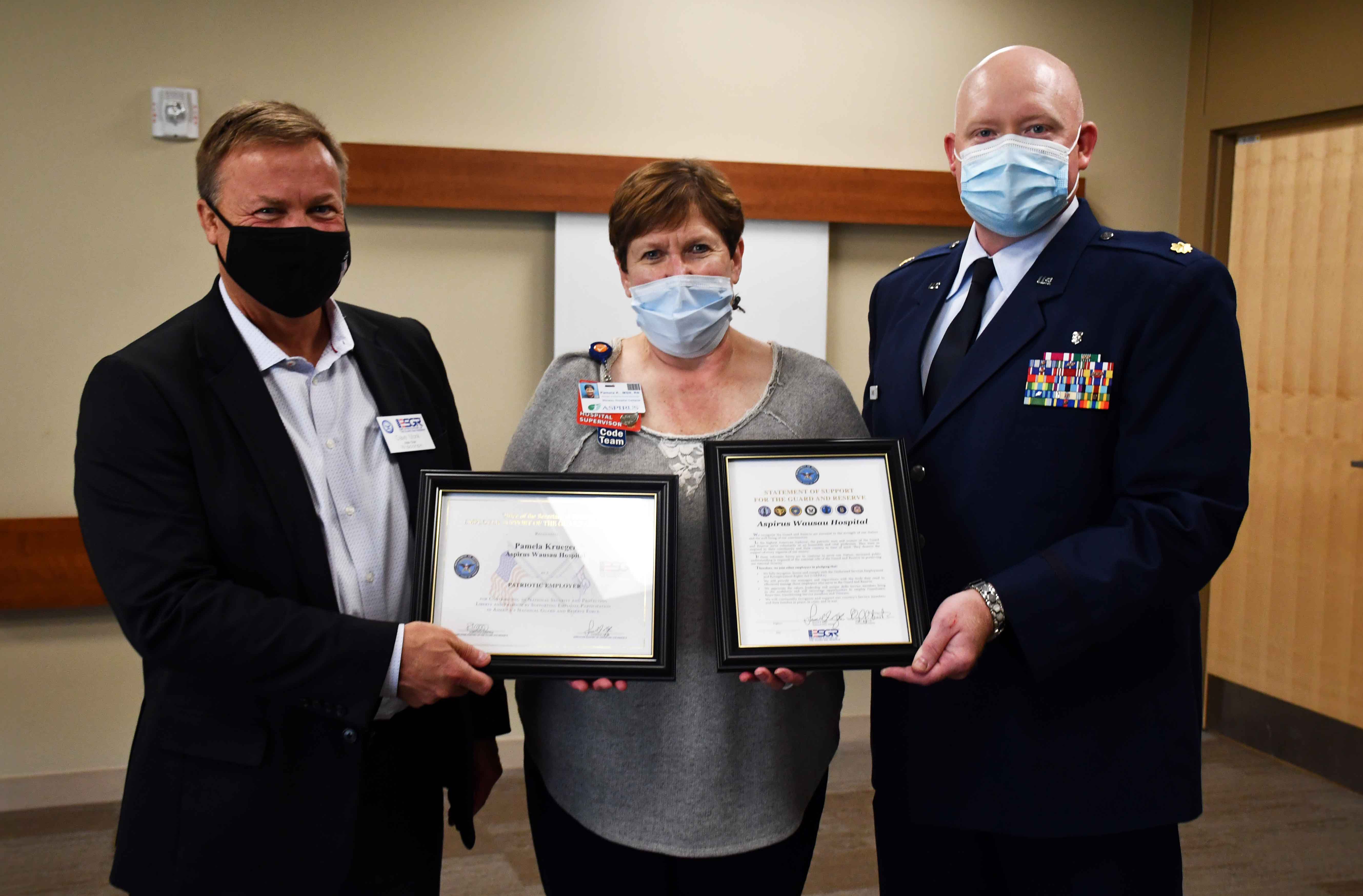 (L to R) Scott Legwold, Chairman of the Wisconsin Committee ESGR, Pamela Krueger, Hospital Clinical Resources Manager and Maj. Seth Dahlke, AWH Hospital Supervisor